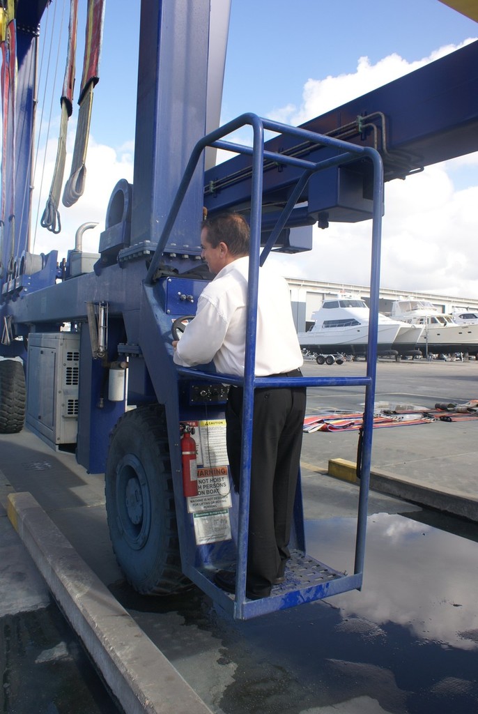 Gold Coast City Marina general manager Steve Sammes, CMM at the controls of his new ’toy’, the marina’s 50-tonne ship lift. - Marina gets a lift © Bob Wonders